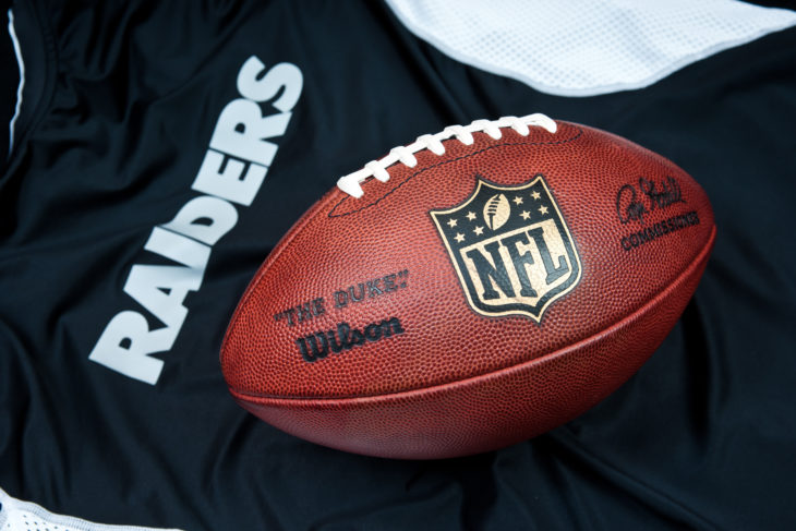 ZAGREB , CROATIA - AUGUST 19 , 2014 : NFL Oakland Raiders club equipment with NFL official ball, product shot - Image