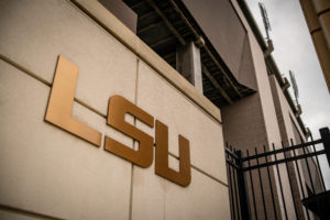 Baton Rouge, Louisiana - February 10, 2020: Louisiana Statue University LSU letters near national football champions banner